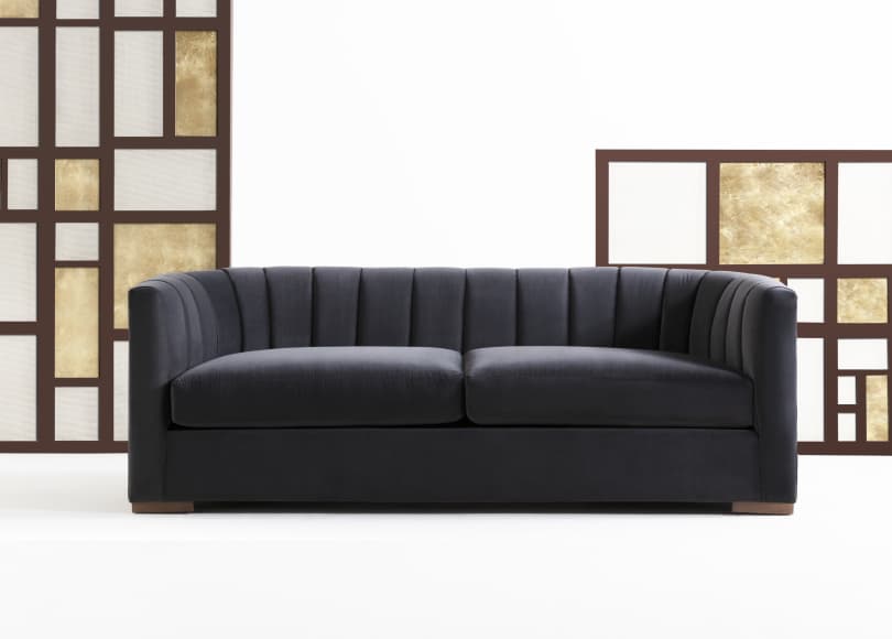 dark grey curved sofa