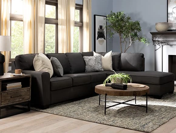Country-rustic Family Room With Mcdade Graphite 2 Piece 114'' Sectional With Right Arm Facing Armless Chaise