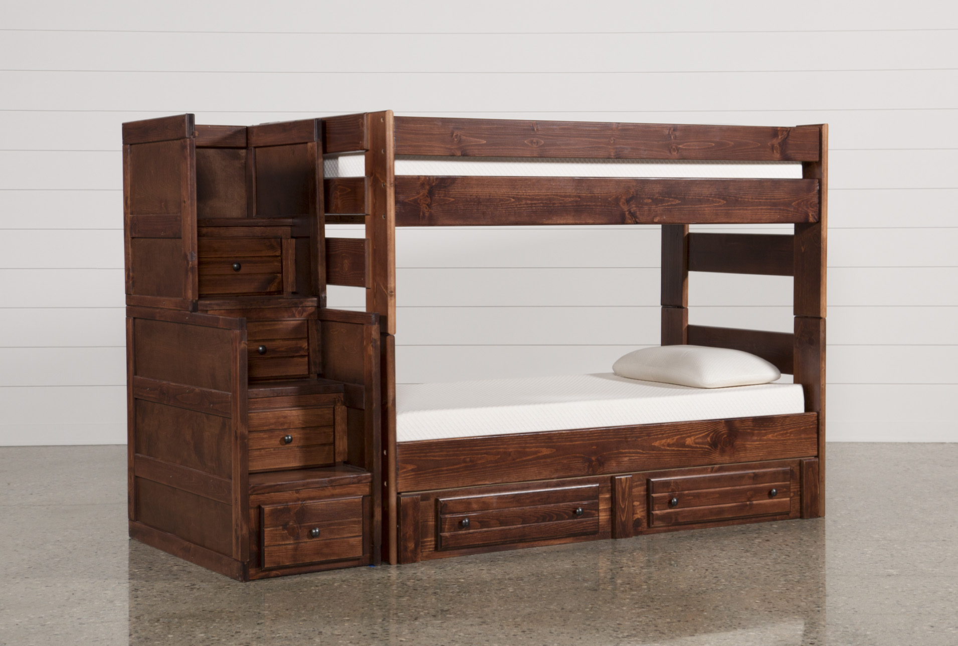 twin over twin bunk beds with stairs and storage