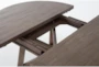 Jaxon Grey 54-72" Round To Oval Extendable Dining Table - Detail