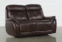 Shane Leather Power Reclining Glider 68" Loveseat With Power Headrest - Signature