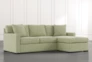 Taren II Green Reversible Sofa/Chaise Sleeper W/Storage Ottoman - Signature