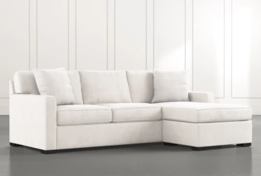 Taren II White Reversible Sofa/Chaise Sleeper W/Storage Ottoman
