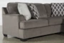 Devonwood 2 Piece Sectional with Left Arm Facing Loveseat and Ottoman - Side