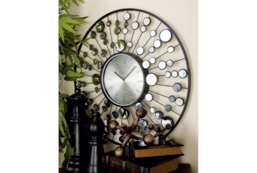 Round Mirror And Metal Wall Clock