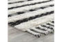 5'X8' Rug- Black And Ivory Shag With Braided Tassels - Detail