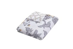 Quilted Reversible Throw Paisley Design To Geometric Pattern