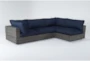 Retreat Outdoor 4 Piece Brown Woven Modular Chaise Sectional With Navy Cushions - Signature