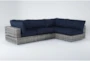 Retreat Outdoor 4 Piece Grey Woven Modular Chaise Sectional With Navy Cushions - Signature