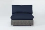Retreat Outdoor Brown Woven Armless Unit With Navy Cushion - Signature