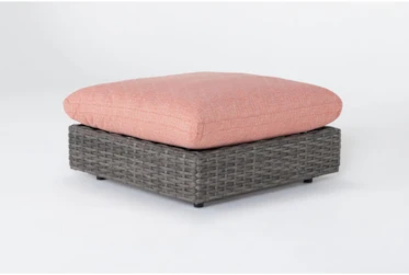 Retreat Outdoor Brown Woven Ottoman With Coral Cushions