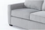 Mathers Oyster 125" 2 Piece Sectional with Right Arm Facing Queen Sleeper Sofa & Storage Ottoman - Detail