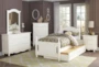 Destini White Twin Poster Bed With Trundle - Room