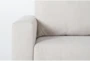 Araceli II Sand 140" 4 Piece Sectional with Right Arm Facing Chaise & Storage Ottoman - Detail