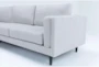 Aries Seal 117" 2 Piece Sectional with Left Arm Facing Chaise & Cocktail Ottoman - Side