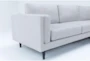Aries Seal 117" 2 Piece Sectional with Right Arm Facing Chaise & Cocktail Ottoman - Side