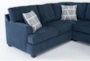 Colby Navy 128" 3 Piece Sectional with Left Arm Facing Tux & Right Arm Facing Chaise & Storage Ottoman - Side