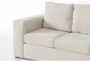 Sebastian Cream White 111" 2 Piece Convertible Futon Sleeper Sectional with Right Arm Facing Storage Chaise - Detail