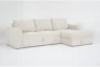 Sebastian Cream White 111" 2 Piece Convertible Futon Sleeper Sectional with Right Arm Facing Storage Chaise - Signature