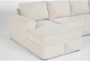 Sebastian Cream 140" 3 Piece Convertible Sleeper Sectional with Left Arm Facing Storage Chaise - Detail