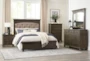 Theron King Wood & Upholstered Panel Bed - Room